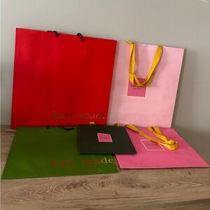 Collection of vintage kate spade shopping bags